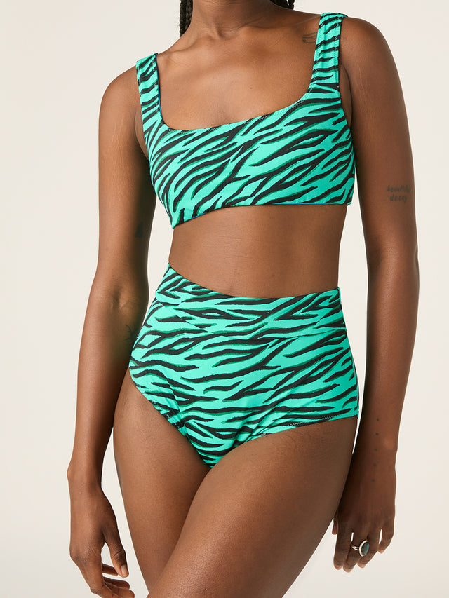 SWSTCRNAPGBW-MB_Recycled Swimwear_Reversible Crop Top_PartyAnimal-OasisBlue_10_model_Amy_10-S.jpg